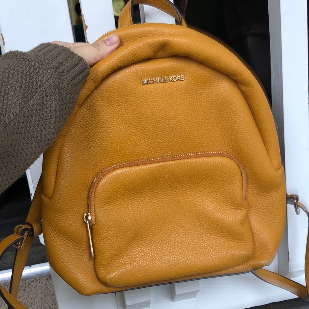 Michael Kors yellow backpack